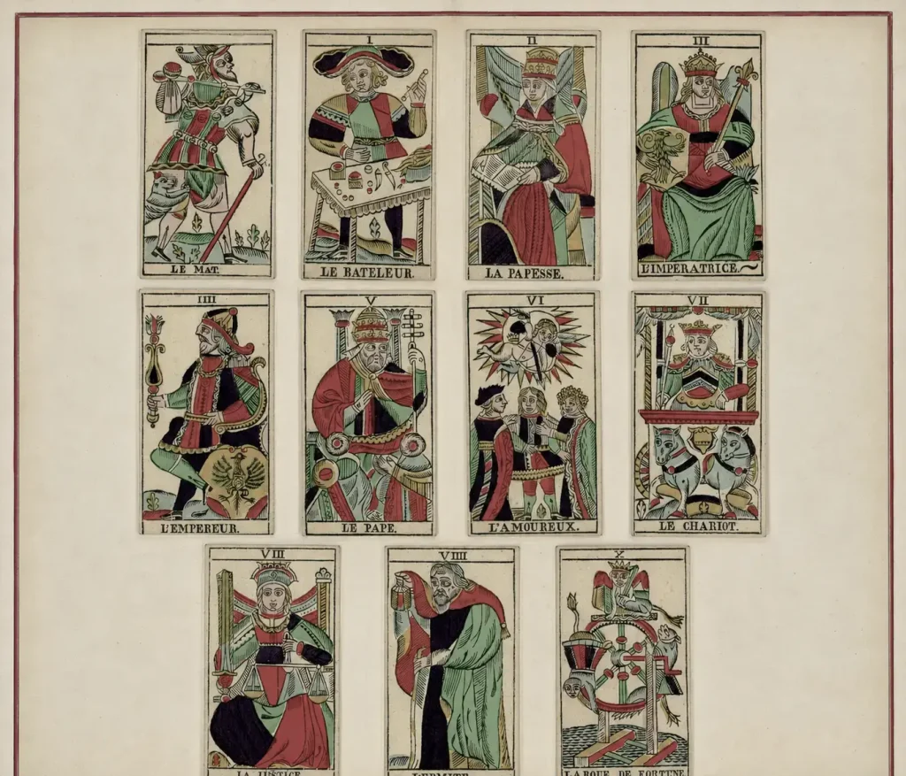 Historic Tarot de Marseille cards featuring The Fool, The Magician, The High Priestess, The Empress, The Emperor, The Pope, The Lovers, The Chariot, Justice, The Hermit, and the Wheel of Fortune.