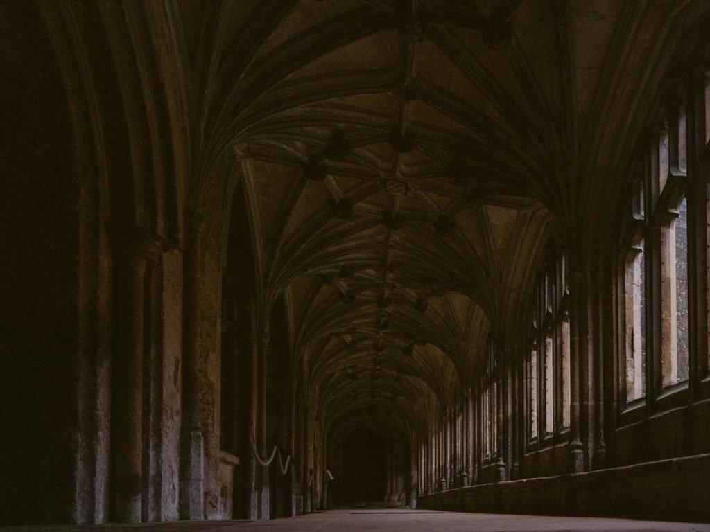 Old monastery corridor symbolizing tradition and spiritual authority